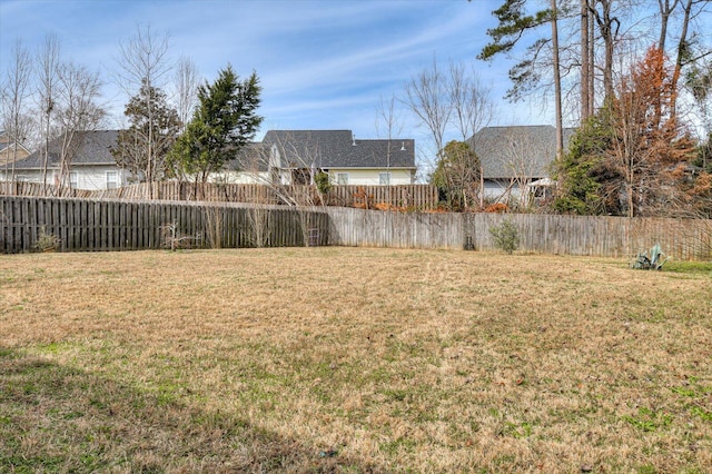 view of yard featuring a fenced backyard