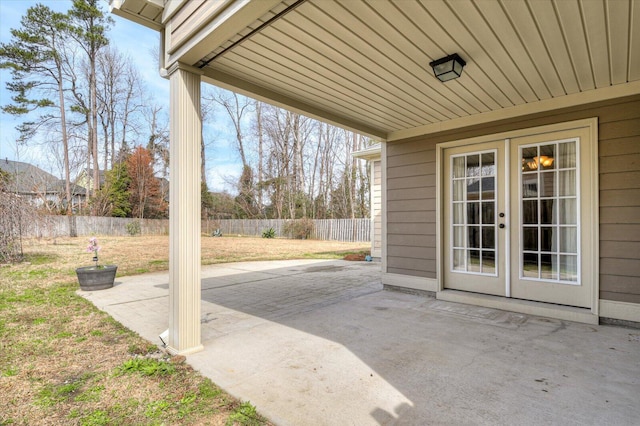 view of patio featuring french doors and a fenced backyard