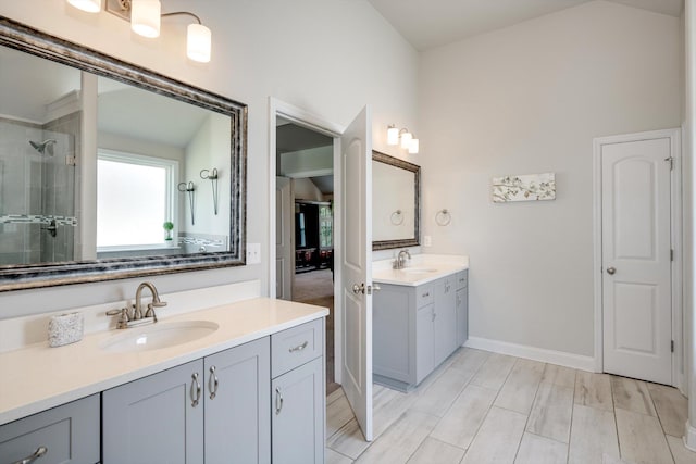 729 Houston Lake Dr, Evans, GA 30809 - full bath featuring a stall shower, plenty of natural light, two vanities, and lofted ceiling