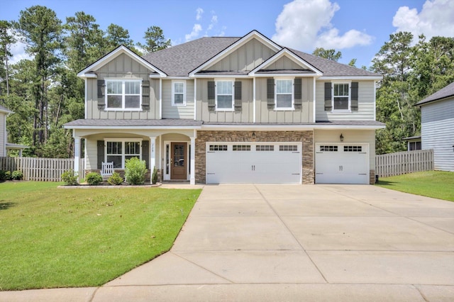 729 Houston Lake Dr, Evans, GA 30809 - craftsman inspired home with board and batten siding, concrete driveway, a garage, a porch, and a shingled roof