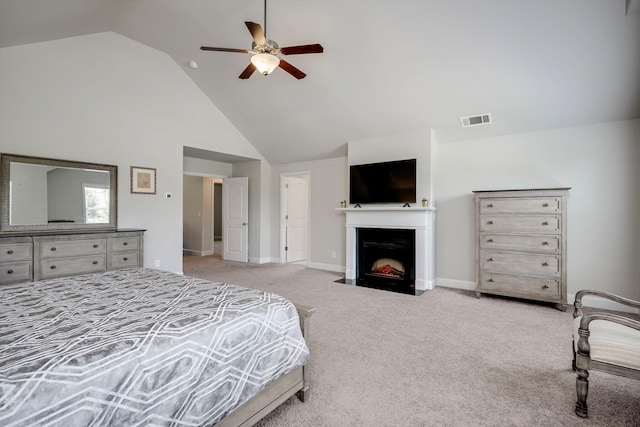 729 Houston Lake Dr, Evans, GA 30809 - bedroom with carpet flooring, high vaulted ceiling, a fireplace with flush hearth, and a ceiling fan
