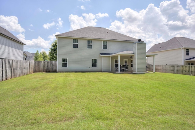 729 Houston Lake Dr, Evans, GA 30809 - back of house featuring a fenced backyard, a ceiling fan, and a patio