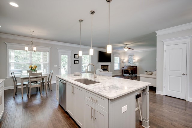 729 Houston Lake Dr, Evans, GA 30809 - kitchen featuring a fireplace, a ceiling fan, open floor plan, stainless steel dishwasher, and dark wood-style flooring
