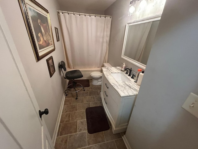 bathroom featuring baseboards, shower / bath combination with curtain, toilet, and vanity