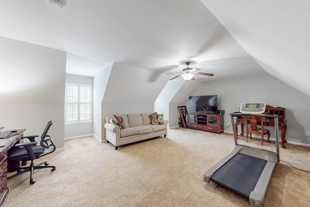 carpeted office with ceiling fan and vaulted ceiling