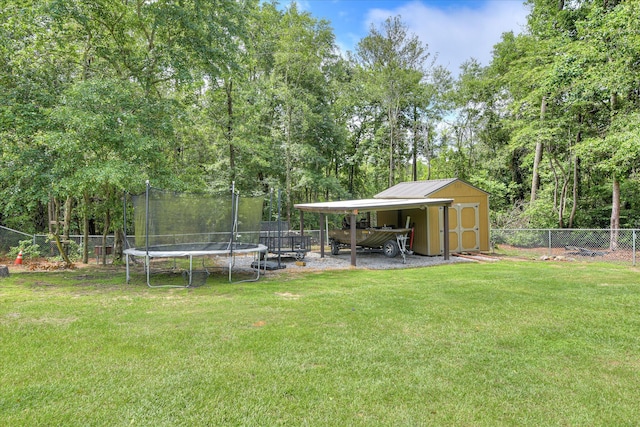 132 Running Creek Dr, North Augusta, SC 29860 - view of yard with a trampoline and a carport