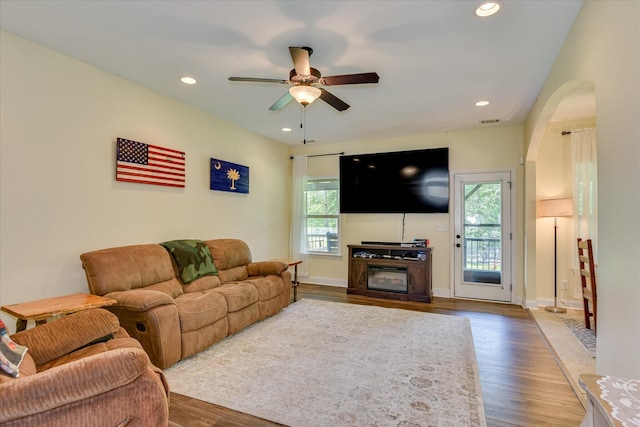 132 Running Creek Dr, North Augusta, SC 29860 - living area featuring plenty of natural light, wood finished floors, arched walkways, a ceiling fan, and recessed lighting