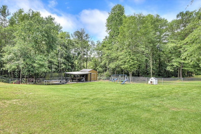 132 Running Creek Dr, North Augusta, SC 29860 - view of yard with a trampoline, a playground, and view of scattered trees