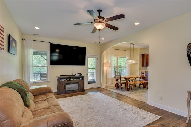 132 Running Creek Dr, North Augusta, SC 29860 - living area featuring arched walkways, healthy amount of natural light, dark wood finished floors, ceiling fan, and recessed lighting