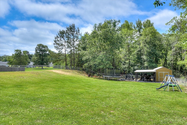 132 Running Creek Dr, North Augusta, SC 29860 - view of yard with a trampoline and a playground