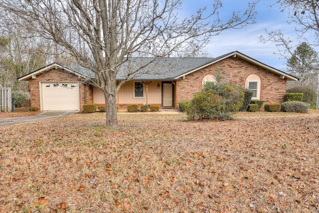 single story home featuring a garage