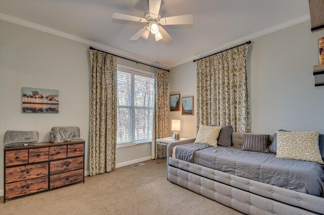 carpeted living room with ceiling fan and crown molding