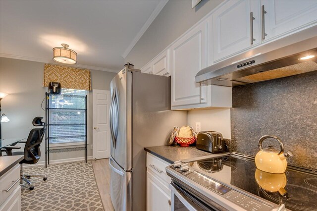 kitchen featuring backsplash, stainless steel appliances, white cabinetry, and ornamental molding