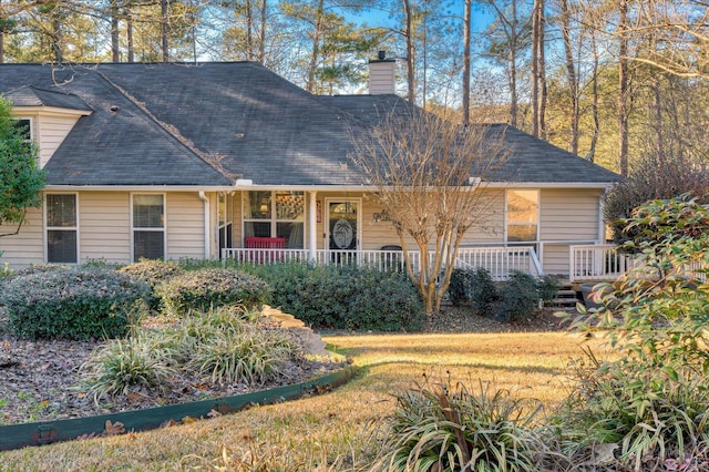 single story home featuring a porch