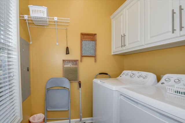 laundry area with cabinets and washing machine and dryer