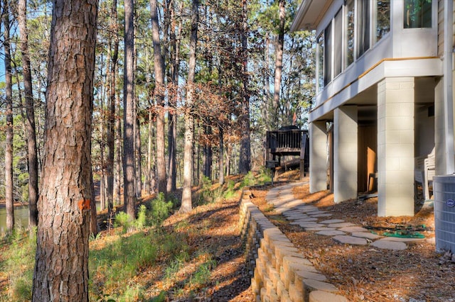 view of yard featuring a wooden deck