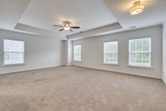 554 Bunchgrass St, Evans, GA 30809 - spare room with a tray ceiling, baseboards, ceiling fan, carpet flooring, and crown molding