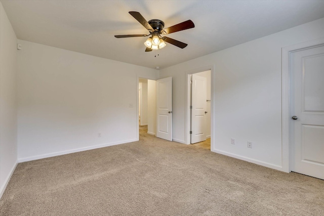 554 Bunchgrass St, Evans, GA 30809 - unfurnished bedroom with light carpet, baseboards, and a ceiling fan