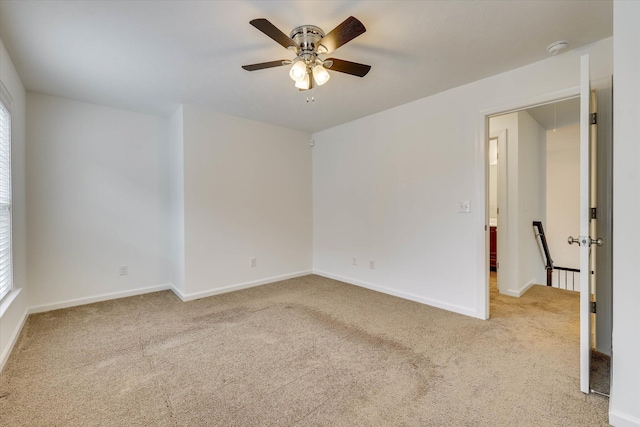 554 Bunchgrass St, Evans, GA 30809 - carpeted spare room with ceiling fan, baseboards, a smoke detector, and plenty of natural light