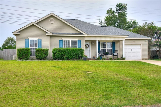 single story home featuring a front yard and a garage