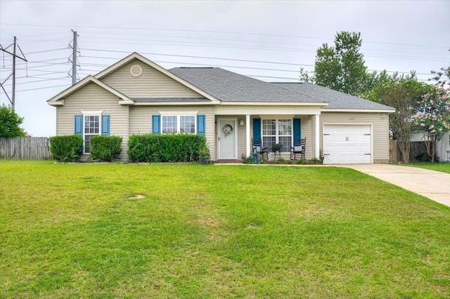 ranch-style home with a front lawn and a garage