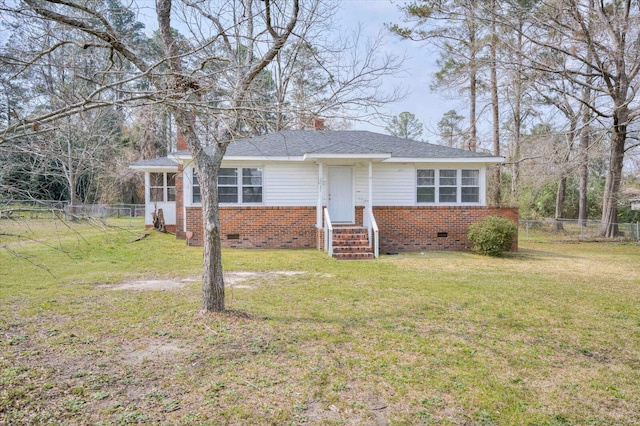 view of front facade with a front lawn, fence, crawl space, brick siding, and a chimney