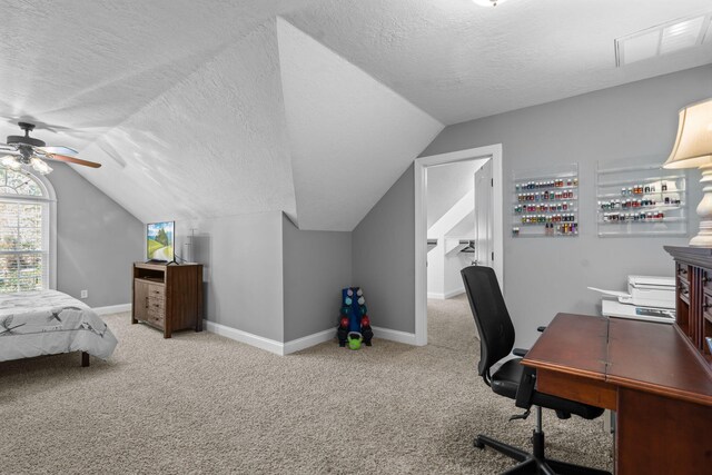 bedroom featuring ceiling fan, light colored carpet, and vaulted ceiling