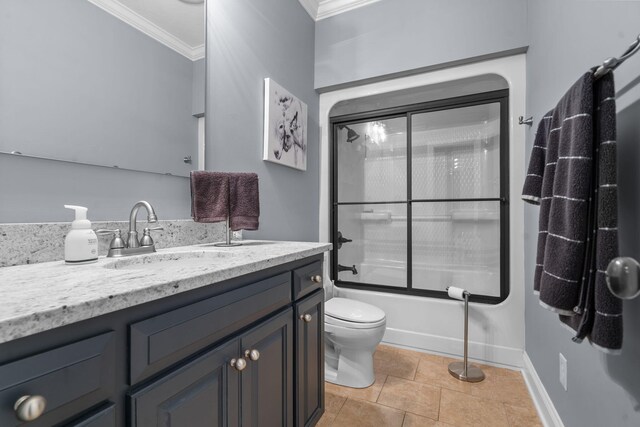 full bathroom with tile patterned flooring, shower / bath combination with glass door, toilet, and ornamental molding