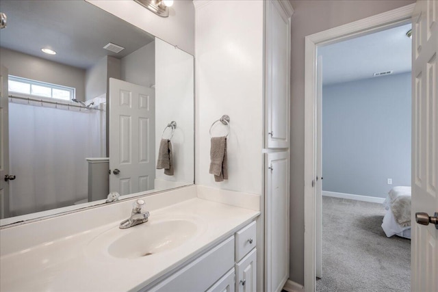 full bathroom with baseboards, visible vents, vanity, and a shower with curtain