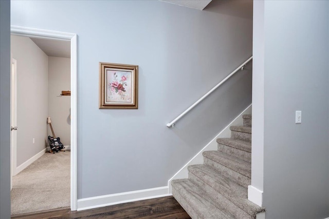 staircase with baseboards