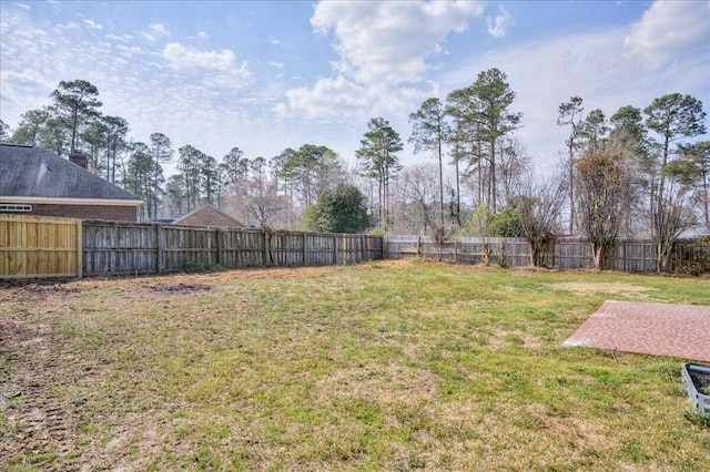 view of yard featuring a fenced backyard