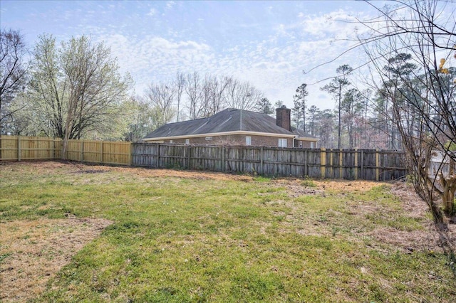 view of yard featuring fence