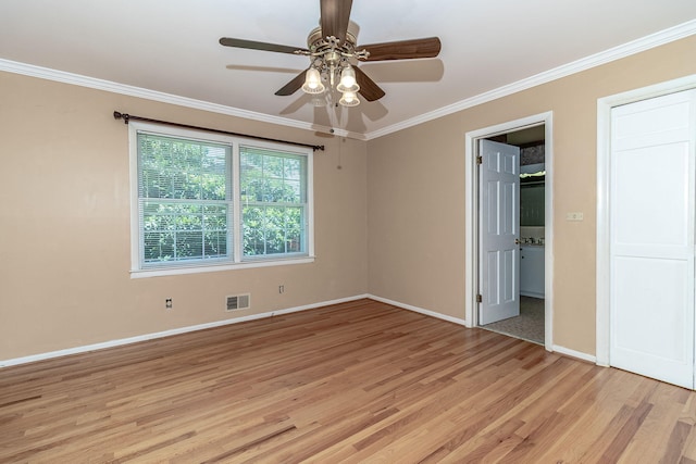 3134 Walton Way, Augusta, GA 30909 - unfurnished bedroom featuring light wood-style flooring, baseboards, ornamental molding, and a ceiling fan