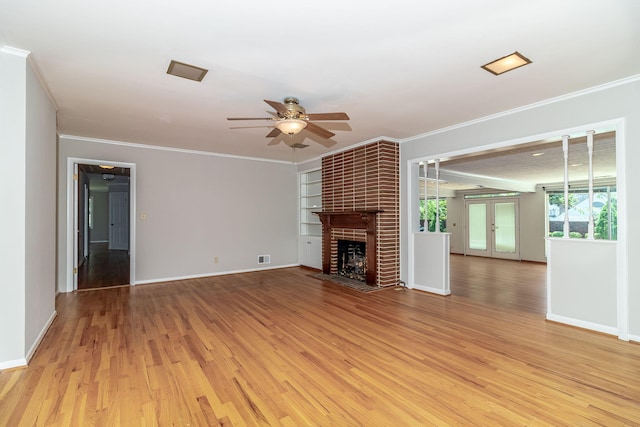 3134 Walton Way, Augusta, GA 30909 - unfurnished living room with a ceiling fan, light wood-style floors, ornamental molding, baseboards, and a brick fireplace