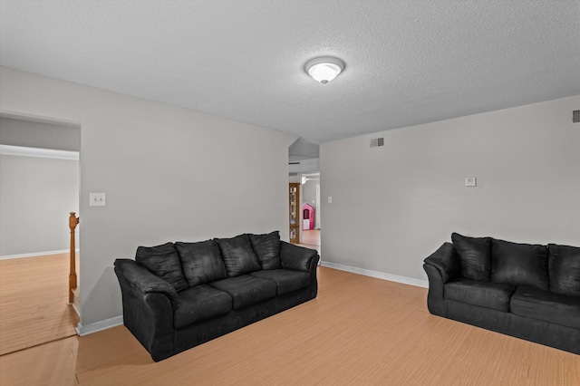 4375 Sandy Ridge Pl, Augusta, GA 30909 - living room with wood finished floors and a textured ceiling