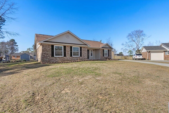 ranch-style home with a front lawn and brick siding