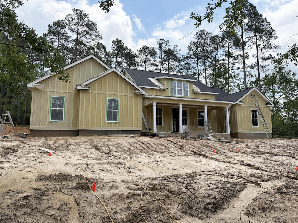 1033 Ferndown Ct, Aiken, SC 29803 - view of front of property featuring a porch, board and batten siding, and roof with shingles
