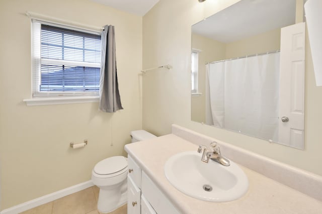 bathroom featuring tile patterned floors, vanity, a shower with shower curtain, and toilet