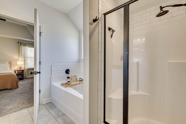 ensuite bathroom with a shower stall, a garden tub, tile patterned floors, and connected bathroom