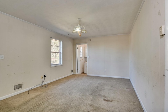 unfurnished room with carpet flooring, a chandelier, and ornamental molding