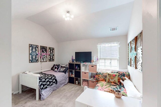 bedroom featuring carpet floors, baseboards, lofted ceiling, and visible vents