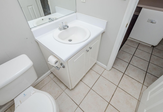 5034 Wheeler Lake Rd, Augusta, GA 30909 - bathroom featuring toilet, vanity, tile patterned flooring, and baseboards