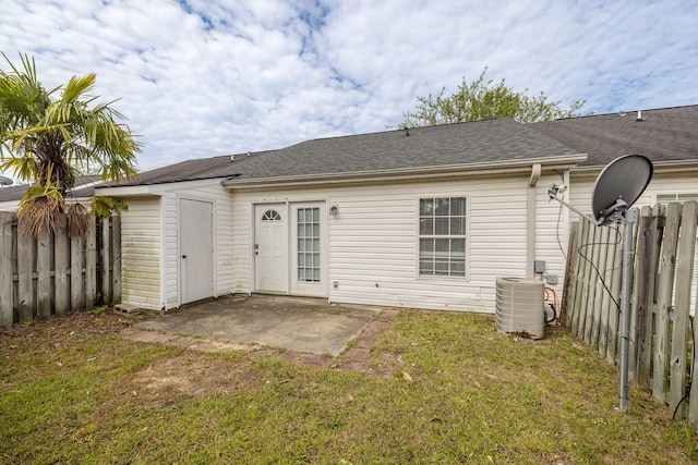 5034 Wheeler Lake Rd, Augusta, GA 30909 - back of property featuring cooling unit, a patio area, and a shingled roof