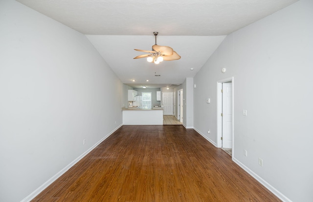 5034 Wheeler Lake Rd, Augusta, GA 30909 - unfurnished living room with a ceiling fan, dark wood-type flooring, baseboards, and lofted ceiling