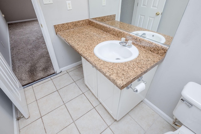 5034 Wheeler Lake Rd, Augusta, GA 30909 - bathroom with toilet, tile patterned floors, vanity, and baseboards