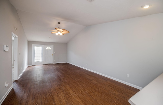 5034 Wheeler Lake Rd, Augusta, GA 30909 - unfurnished living room featuring ceiling fan, lofted ceiling, dark wood-style floors, and baseboards