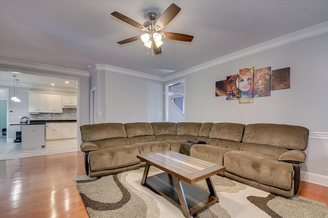 3463 Rhodes Hill Dr, Augusta, GA 30907 - living room featuring crown molding, ceiling fan, light wood-type flooring, and baseboards
