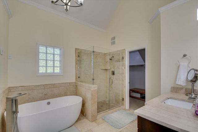 3463 Rhodes Hill Dr, Augusta, GA 30907 - bathroom featuring a shower stall, a freestanding tub, vanity, a chandelier, and tile patterned floors