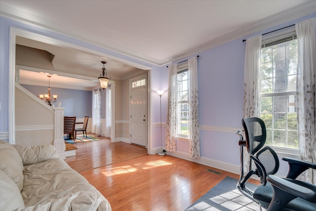 3463 Rhodes Hill Dr, Augusta, GA 30907 - home office with a chandelier, wainscoting, light wood finished floors, and crown molding