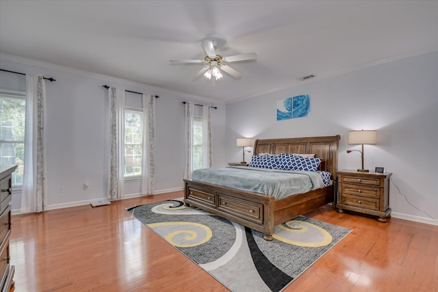 3463 Rhodes Hill Dr, Augusta, GA 30907 - bedroom with ornamental molding, light wood finished floors, baseboards, and ceiling fan